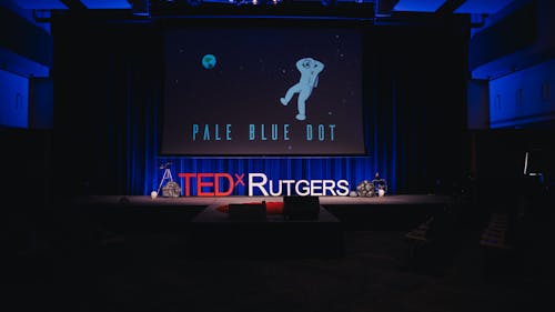  The theme for this year's TEDxRutgers was "Pale Blue Dot", which is a reference to a photograph taken by the space probe Voyager 1, which showed Planet Earth as a small speck. The theme aims to remind people to take a step back and look at the larger picture.  – Photo by Thomas Boniello