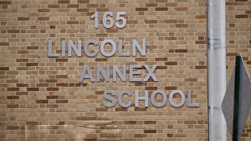 The plan to sell the Lincoln Annex School to build the Rutgers Cancer Institute on the land inspired three Rutgers alumni to run for the New Brunswick Board of Education. – Photo by Facebook