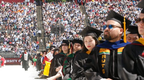 Approximately 6,500 graduates of the Rutgers Class of 2019 sat in HighPoint.com Stadium to hear keynote speakers Jason and Devin McCourty speak about how to "redefine success." – Photo by Dustin Niles