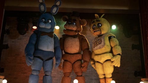 Freddy Fazbear, Bonnie and Chica are scary, animatronic antagonists in the "Five Nights at Freddy's" film. – Photo by @FNAFMovie / X.com