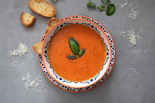 Tomato soup can be paired with grilled cheese or croutons but tastes just as delicious on its own. – Photo by Julia Kicova / Unsplash.com