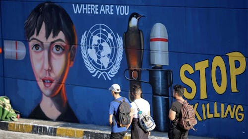 Murals in Baghdad, Iraq, question where the United Nations is when violations of international laws occur, and Omar Dewachi, an associate professor in the Department of Anthropology, said the media at the time did not help the Iraqi struggle. – Photo by @SaadGuerraoui / X.com