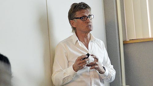 Dr. Mads Gilbert, a professor from the University Hospital of North Norway, discusses the state of Gaza three years after Operation Cast Lead yesterday in the Busch Campus Center. – Photo by Lianne Ng