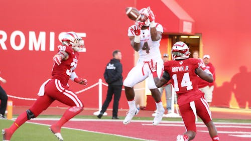 Leonte Carroo ascends to catch the ball at the highest point before hauling in the 43-yard touchdown pass from sophomore quarterback Chris Laviano at the 2:06 mark in the third quarter on Saturday at Memorial Stadium. The senior wide receiver left the game and did not return after recording his third touchdown catch of the game, but still managed to post a game-high 157 yards on seven catches to boost the Rutgers passing game in a 55-52 shootout win against Indiana. – Photo by Edwin Gano