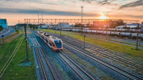 Trains offer accessible transportation to passengers while also creating more sustainable infrastructure. – Photo by Silver Ringvee / Unsplash