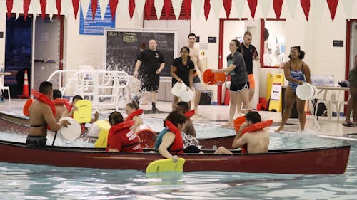 On Tuesday night, Outdoor Recreation and Intramural Sports organized a Canoe Battleship event in the Cook/Douglass Recreation Center to help students beat the heat. – Photo by Jeffrey Gomez