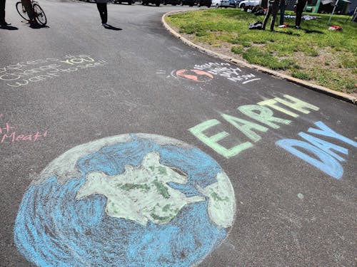 Organizers gathered for an Earth Day rally, asking for environmental change from the University. – Photo by Surabhi Ashok