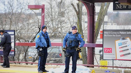 Police investigate the scene where a man was hit by an NJ Transit train. Four other individuals were injured by the impact of his flying body parts. – Photo by Tian Li