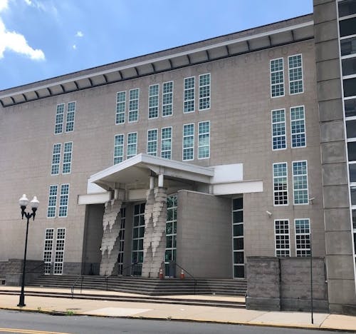 At the family court building in Downtown New Brunswick this week, the unnamed teenage defendant was ordered to remain in custody after being charged with making an online threat against the school administrator.   – Photo by Jarrett / GoogleMaps.com