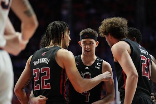 Senior guard Paul Mulcahy, fifth-year senior guard Caleb McConnell, junior forward Dean Reiber and the Rutgers men's basketball team are facing a must-win situation against the 12-14 Cornhuskers at home. – Photo by ScarletKnights.com
