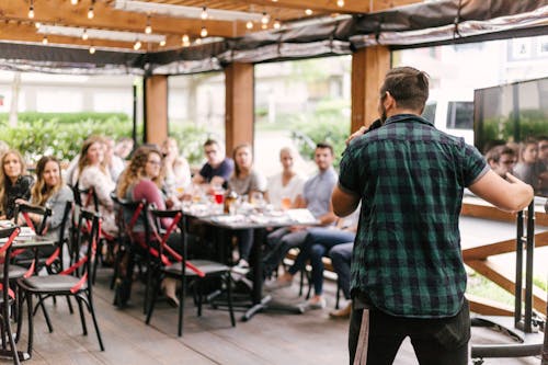 The key to being a great public speaker lies in being able to connect with your audience and deliver your message with skill.  – Photo by Priscilla Du Preez / Unsplash