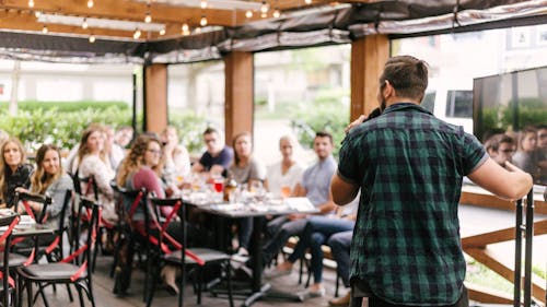 The key to being a great public speaker lies in being able to connect with your audience and deliver your message with skill.  – Photo by Priscilla Du Preez / Unsplash