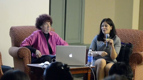 Muriel Magenta, an art history professor at Arizona State
University, and Rebecca Wright, a professor in the computer science
deparment, share stories about being women in the science and art
fields last night in the Douglass Campus Center. – Photo by Nelson Morales