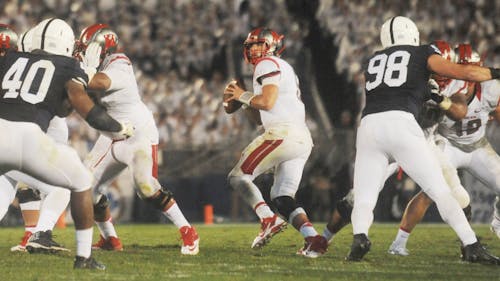 Sophomore quarterback Chris Laviano drops back to pass during the Knights’ 28-3 loss to the Nittany Lions on Saturday night. – Photo by Photo by Michelle Klejmont | and Michelle Klejmont The Daily Targum