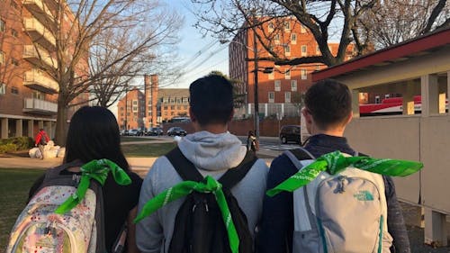  For The Bandana Project, which was launched by the Rutgers University Student Assembly, students will tie green bandanas to their backpacks to demonstrate support for those suffering from mental illness.  – Photo by Courtesy of RUSA