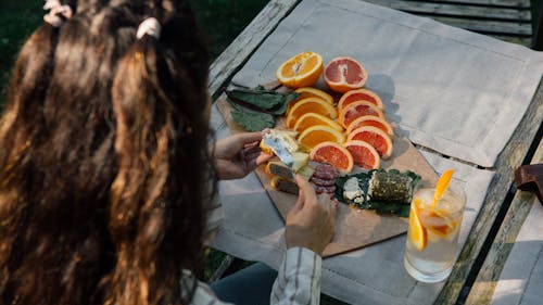 Even though it started as a light-hearted TikTok trend, "girl dinner" may actually encourage disordered eating and toxic competition among women. – Photo by Thought Catalog / Unsplash