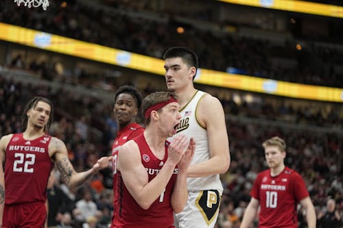 Senior guards Paul Mulcahy and Cam Spencer, fifth-year senior guard Caleb McConnell, freshman guard Antwone Woolfolk and the Rutgers men's basketball team could not overcome Purdue in the quarterfinals of the Big Ten Tournament. – Photo by @Exponent_Sports / Twitter