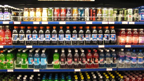  Due to limited storage room and refrigerator space, Woody's Cafe cannot allow for bottled beverages to be included as part of a student's meal swipe. Instead, students are only permitted to get a fountain drink or carton of milk as a beverage.  – Photo by Wikimedia