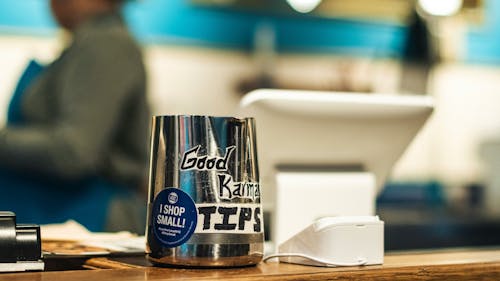With the pressure of tipping culture growing, what do tipping wage policies say about how companies pay their workers? – Photo by Dan Smedley/Unsplash