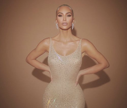 Kim Kardashian revealed she underwent extreme weight loss to wear Marilyn Monroe's dress at the 2022 Met Gala, raising concerns over unrealistic beauty standards influenced by the media. – Photo by @KimKardashian / Twitter