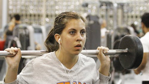 Nicole Hurtado, a School of Arts and Sciences junior, works out at the Sonny Werblin Recreation Center on Busch campus. Rutgers experts say even a little regular physical activity can help them avoid the    much feared “Freshman 15.” – Photo by Edwin Gano