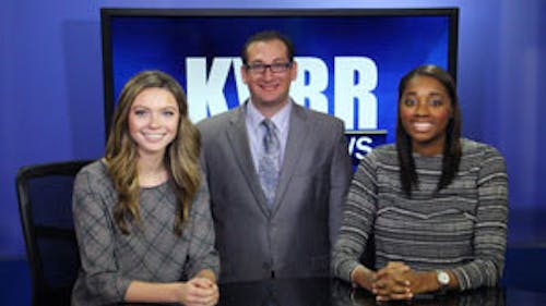 Jakie Kelly (left), Scott Sincoff (center) and Morgan Parrish (right) are all recent Rutgers graduates that ended up at the KVRR-TV newsroom in Fargo, North Dakota. Kelly and Parrish both applied to the station after Sincoff posted about job openings in an alumni board.  – Photo by Ken Branson