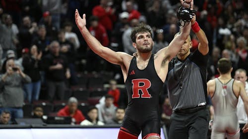 Junior 149-pounder Michael Cetta earned an upset win over No. 9 Dylan D'Emilio in the Rutgers wrestling team defeat to Ohio State on Sunday. – Photo by Scarletknights.com / Cos Lymperopoulos