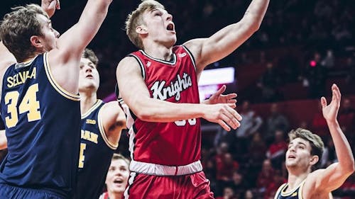 Graduate student guard Zach Hayn scored his lone points on the season with a tough layup against Michigan. – Photo by @zach.hayn , @rutgersmbb / Instagram