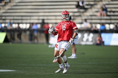 Senior midfielder Justin Kim contributed a hat trick to the Rutgers men's lacrosse team's game against Johns Hopkins. – Photo by Greg Fiume