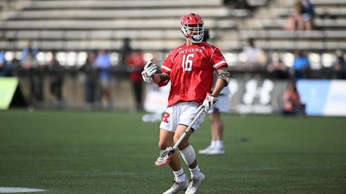 Senior midfielder Justin Kim contributed a hat trick to the Rutgers men's lacrosse team's game against Johns Hopkins. – Photo by Greg Fiume