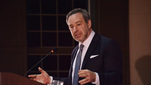 On tour supporting his latest book, David Frum, a senior editor at The Atlantic, met a packed audience at the Douglass Student Center on Wednesday where he discussed his views on American democracy under President Donald J. Trump.  – Photo by Casey Ambrosio