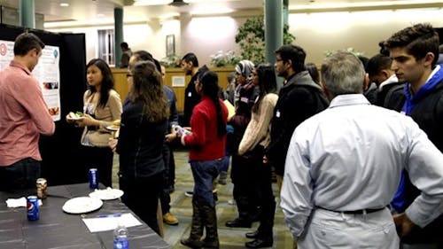 Students gather at the Busch Student Center March 3 for the Second Annual Research Fair, hosted by the Society of Women Engineers and Sigma Phi Delta, a professional engineering fraternity.  – Photo by Yangeng Lin