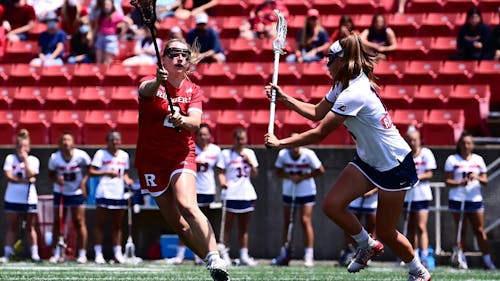 Sophomore midfielder Mikayla Dever contributed a goal and an assist late in the game to help the Rutgers women's lacrosse team come back to defeat Ohio State to end its regular season. – Photo by Scarletknights.com