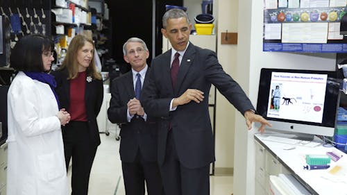 U.S. President Barack Obama (right) tours the Vaccine Research Center with Dr. Nancy Sullivan (left), U.S. Secretary of HHS Sylvia Burwell (far left), and Dr. Anthony Fauci (far right) to talk about Ebola, during a visit to the National Institutes of Health in Bethesda, Maryland, yesterday. – Photo by Reuters