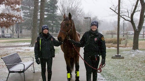 During the early 1970s, Rutgers first adopted horseback police mounties to patrol parts of what were then known as Cook and Douglass Colleges. The program has since expanded to include student riders. – Photo by Facebook
