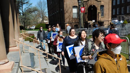 On April 12, graduate students protested for funding extensions outside of the Board of Governors meeting in Winants Hall on the College Avenue campus.  – Photo by Courtesy Alan Maass 