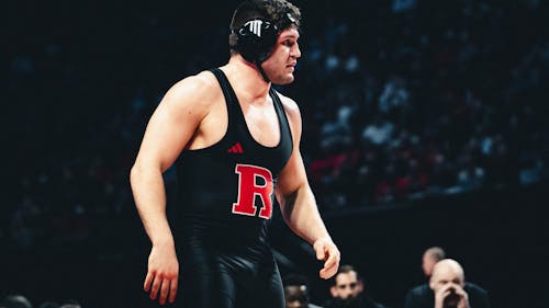 Graduate student 285-pounder Yaraslau Slavikouski of the Rutgers wrestling team defeated Yonger Bastida in his 8-3 decision to become an All-American for the first time in his collegiate career.  – Photo by Evan Leong