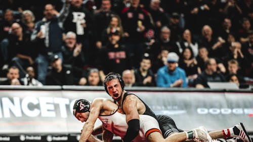 Junior 125-pounder Dean Peterson won 1 of the Rutgers wrestling team’s 4 bouts in its loss to Virginia Tech. – Photo by Sarah Snyder / ScarletKnights