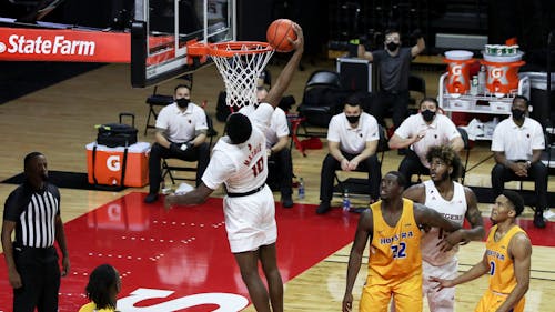 Junior guard Montez Mathis, junior center Myles Johnson and the Rutgers men's basketball team will try to make it 2-0 against Northwestern this season. – Photo by Kelly Carmack / Photo Editor