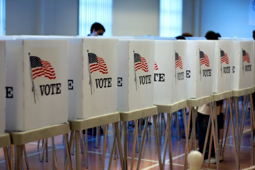 American voters should not be required to select a specific candidate in elections, but they should be required to show up to the polls or send in a mail-in ballot with at least an answer of "no candidate." – Photo by David P / Flickr