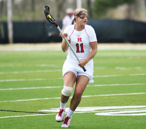 Working mom Laura Brand of Rutgers women's lax 'a coach at home