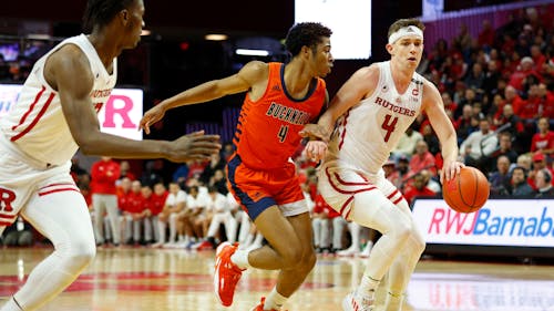 Senior guard Paul Mulcahy, freshman forward Antwone Woolfolk and the Rutgers men's basketball team breezed by Bucknell. – Photo by @RutgersMBB / Twitter