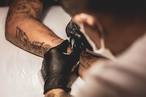If you're thinking of getting a tattoo, this advice may help you make your choice and avoid tattoo regret. – Photo by Lucas Lenzi / Unsplash