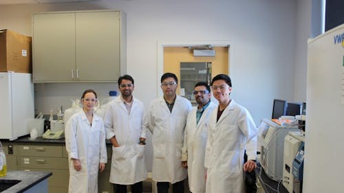 Courtesy of the New Jersey Center for Biomaterials | Vinod Damodaran, second from the right, died after a fire broke out in his apartment last week. His wife and daughter also perished during the blaze. – Photo by null