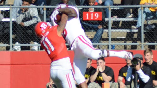 Sophomore cornerback Isaiah Wharton attempts to stop an Indiana receiver from corralling a pass from Hoosier quarterback Richard Lagow, something he struggled to do all afternoon in Rutgers' 33-27 loss to the visitors. Wharton had perhaps the worst game of his career on the Banks as Indiana shred the Knights' secondary to the tune of 420 passing yards. – Photo by Jeffrey Gomez