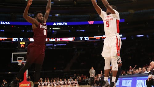 Junior guard Mike Williams attempts a three-point shot in Rutgers' 68-53 win over Fordham at Madison Square Garden on Sunday. Williams paced the Knights with 19 points, while also adding six rebounds.  – Photo by Dimitri Rodriguez
