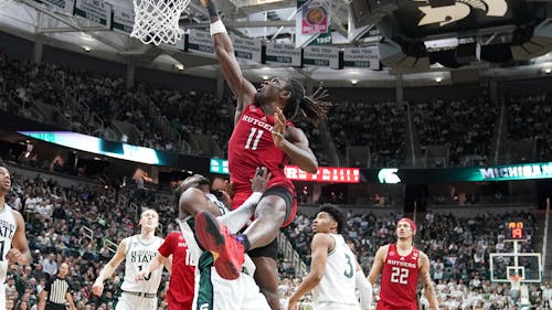 Junior center Cliff Omoruyi, fifth-year senior guard Caleb McConnell and the Rutgers men's basketball team struggled to shoot and ultimately lost to Michigan State. – Photo by @RutgersMBB / Twitter 