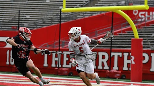 Senior attacker Ross Scott scored 3 goals and dished out three assists in the Rutgers men's lacrosse victory over Utah. – Photo by Tom Gilbert / ScarletKnights.com